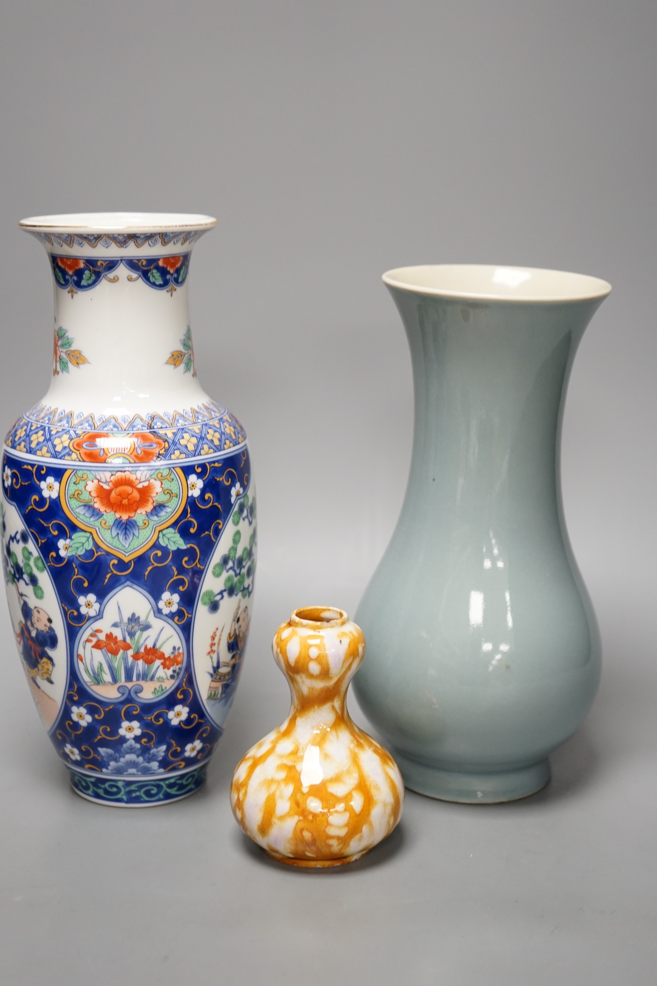 A Chinese Clair De Lune glazed baluster vase and two other Chinese vases. Tallest 26.5cm